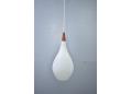 Drop shaped pendant with opaline glass shade made by Holmegaard of Copenhagen.