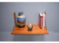 Wallmounted single rosewood shelf ideal for use as a small desk.