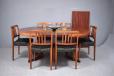Midcentury design oval top dining table in rosewood with 2 leaves.