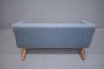 2 seat Mikael Lauersen model ML90 sofa in blue fabric with oak legs.