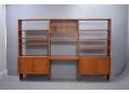 Vintage Danish design open back storage unit with adjustable shelving. SOLD