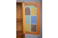 Top doors made with coloured panes of glass in a leaded frame