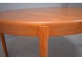 Midcentury Danish design dining table with tapering legs and round top