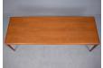 Vintage teak louge table with cylindical tapering legs designed by Henry W Klein for Bramin