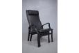 Modern Danish armchair with high back, matching stool and black leather upholstery - view 10