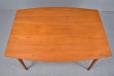 Slim oval dinign table with fixed frame made by danish cabinetmaker