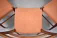 Salmon colour fabric upholstered seats in good condition on all 8 chairs