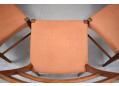 Salmon colour fabric upholstered seats in good condition on all 8 chairs