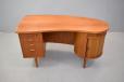 Asymmetric teak desk with drawers and tambour door cabinet