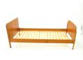 Teak framed single bed made in Denmark with curved foot board.
