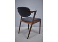 The elegant legs at the rear narrow inward to give the chair a slimmer appearance. Model 42 
