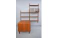 1947 poul Cadovius dining table in vintage teak with 4 shelves and glass cabinet