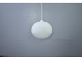 1960s design pendant light with oval shaped shade in opaline glass.