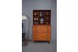 Solid teak wall unit of chest of drawers with open bookcase top. Hvidt & Molgaard design