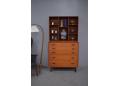Solid teak wall unit of chest of drawers with open bookcase top. Hvidt & Molgaard design