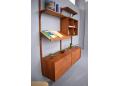 Teak CADO system with 2 shelves, one sloped shelf, 2 cabinets and 4 divider shelves 