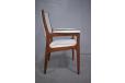 Dark burma teak frame armchair with new upholstery.