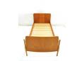 Danish design single bed in teak with oak legs. SOLD