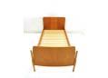 Danish design single bed in teak with oak legs. SOLD