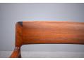 gently curved arms of solid Rio-rosewood offer great support