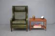 Classic wingback armchair in original green leather - view 11
