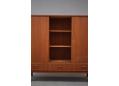 Drawer fronts with lipped and inset to solid teak face.