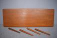 Vintage coffee table in teak with rosewood details and removable legs produced by BRAMIN