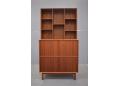 Solid teak wall unit of tambour door cabinet with open bookcase top. Hvidt & Molgaard design