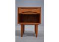 Pair of bedside tables in rosewood with a single drawer each.