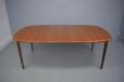 Slender teak coffee table with 2 extra leaves designed and produced 1960s
