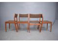 Set of 4 teak frame dining chairs upholstered in original fabric.