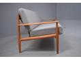 Sprung single seat & back cushion teak sofa by Grete Jalk