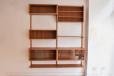 Modular teak shelving system designed by Prebend Sorensen