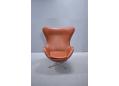 Fritz Hansen produced Egg chair in brown walnut leather upholstery.