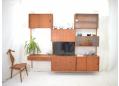 Danish design teak wall-mounted storage system with 7 cabinets. SOLD