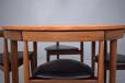 The classic danish design of chair back integrating with the table edge.
