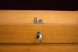 Roll front door fitted with spring loaded lock.