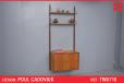Modular wall mounted storage system in teak designed by Poul Cadovius - view 1