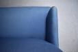 Blue fabric compact frame sofa with coil sprung seating for sale. 