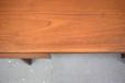 Repairs to teak veneer on leading edge of desk above knee hole