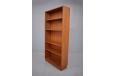 Narrow bookcase in teak with adjustable shelves