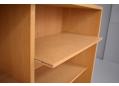 Adjustable shelves on metal supports hidden inside each shelf, solid block wood construction