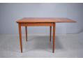 Danish dining table with square top and 2 draw leaves to seat 6