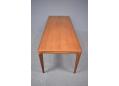 Very long Danish design teak coffee table with pull out hot stand.