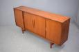 Sideboard in vintage teak made with 4 easy slide doors in the mid 1960s by danish mobelfabrik