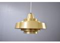 Midcentury design pendant light with ringed shades in brass