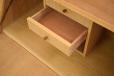 Easy to lock with the same key used on the writing surface and top drawer