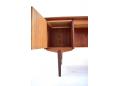 Spacious cupboard storage in teak 1960s desk