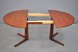 Round top pedistal leg dining table in rosewood produced by Gudme