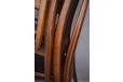 Laminated rosewood back legs ensure strength and enables the curved shape